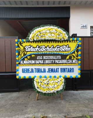 Papan Bunga Duka di Warudoyong